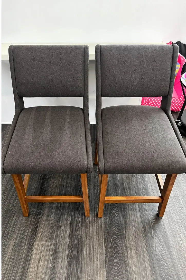 The same two upholstered chairs after cleaning by 4 Elements