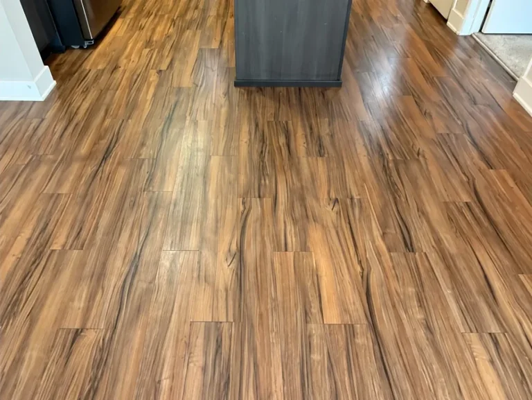 The same wood-look plank floor after cleaning by 4 Elements